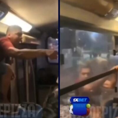 hombre se trepo en la ventana de un bus