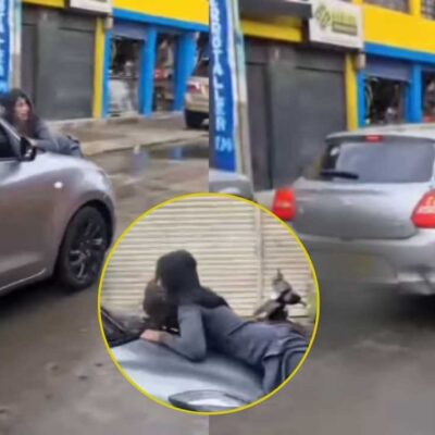 mujer se lanzó a auto en movimiento