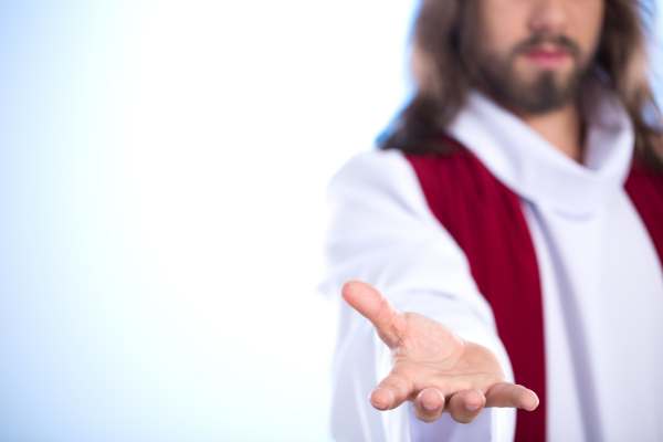 Foto de Jesús extendiendo la mano.