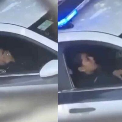 video de dos policías en una patrulla en una vía pública.