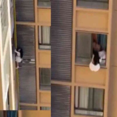 mujer escapo por la ventana de un edificio